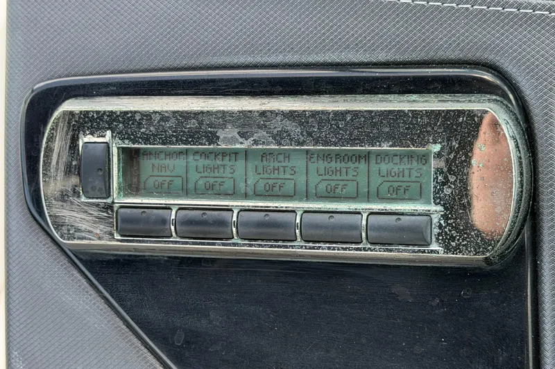 Slide: The Image of A control panel with buttons for various boat lights, including anchor and cockpit lighting. - 39