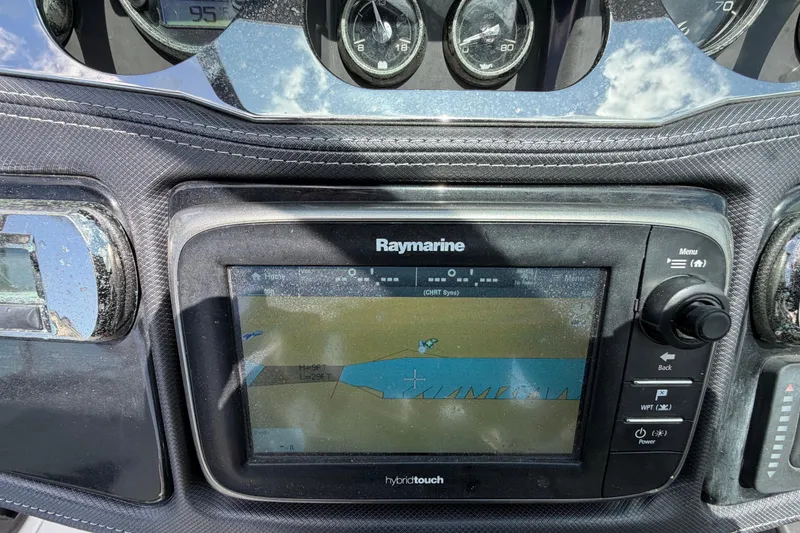 Slide: The Image of Dashboard of a 2015 Monterey 288SS Super Sport with Raymarine navigation display. - 37