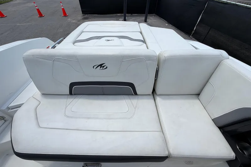 Slide: The Image of 2015 Monterey 288SS Super Sport boat with white cushioned seating and logo. - 68