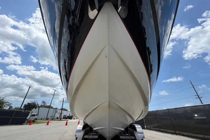Slide: The Image of 2015 Monterey 288SS Super Sport boat on trailer under blue sky. - 12