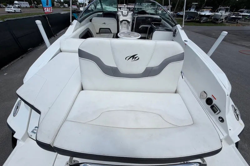 Slide: The Image of 2015 Monterey 288SS Super Sport boat interior with white seating and dashboard view. - 14
