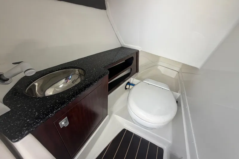 Slide: The Image of 2015 Monterey 288SS Super Sport boat bathroom with sink and toilet. - 20