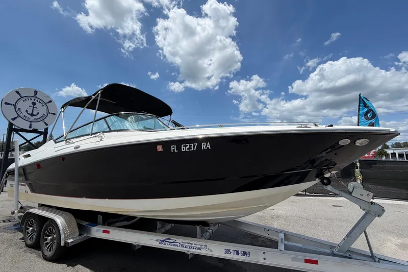 The Image of 2015 Monterey 288SS Super Sport boat on trailer under blue sky. - 0