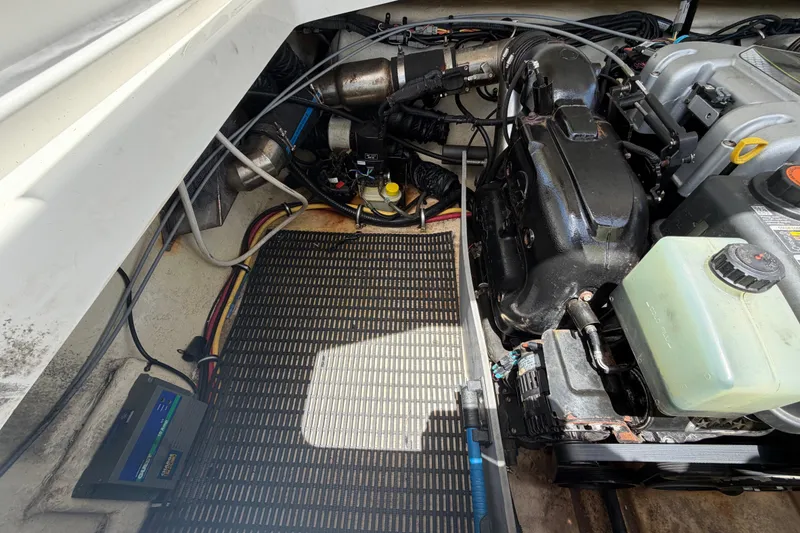 Slide: The Image of Engine compartment of a 2015 Monterey 288SS Super Sport boat, showing mechanical components. - 64