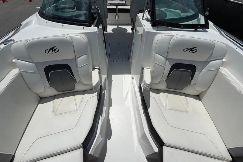 Slide: The Image of Interior of a 2015 Monterey 288SS Super Sport boat with white seating. - 56