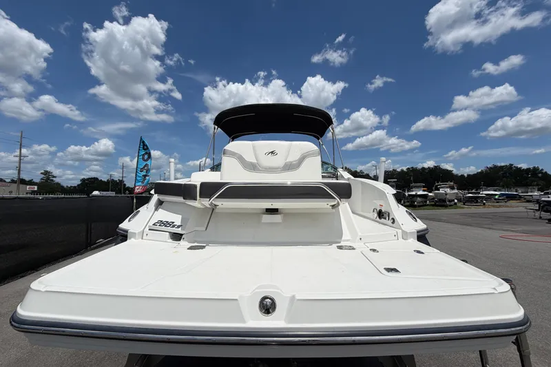 Slide: The Image of 2015 Monterey 288SS Super Sport boat under a bright blue sky with clouds. - 3
