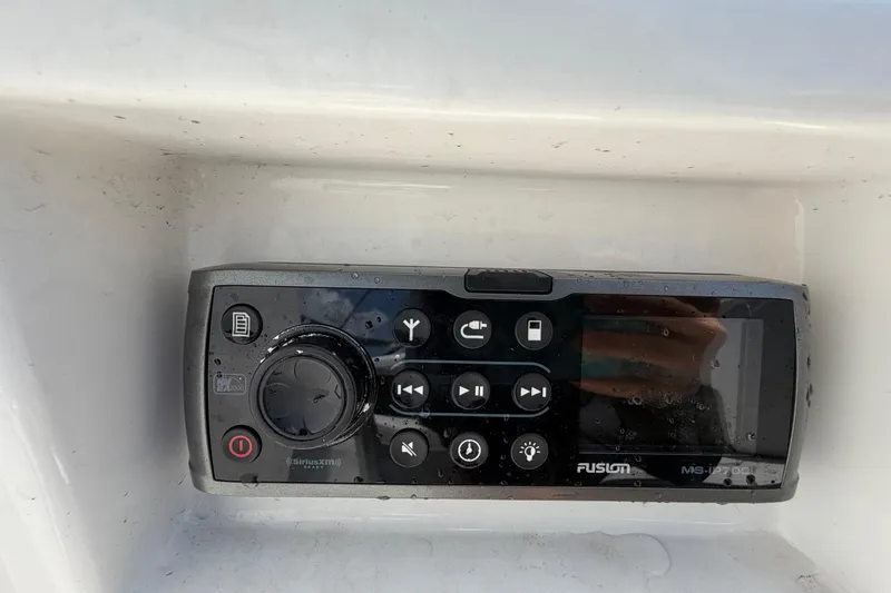 Slide: The Image of Fusion marine stereo system on a 2015 Monterey 288SS Super Sport boat. - 75