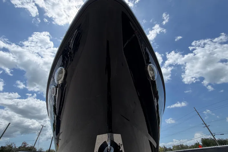 Slide: The Image of 2015 Monterey 288SS Super Sport boat against a bright blue sky with clouds. - 11