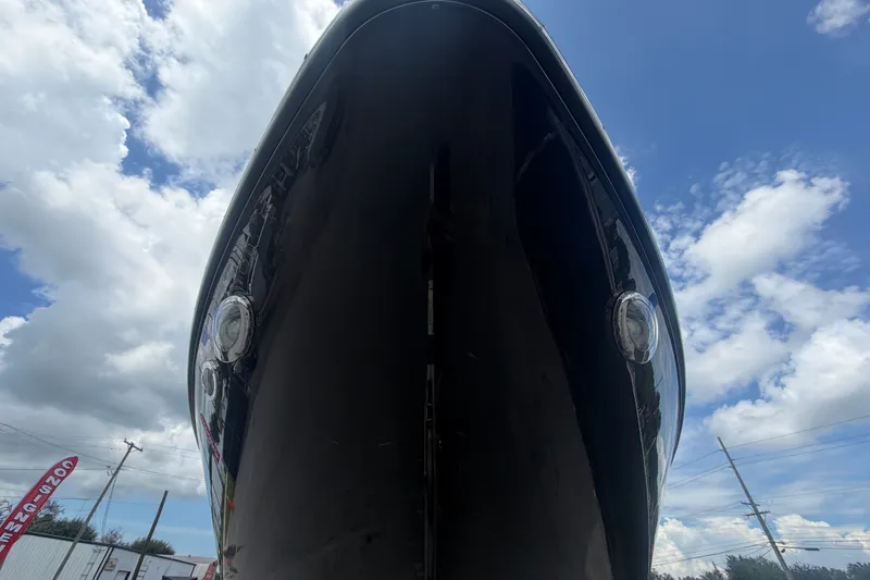 Slide: The Image of 2015 Monterey 288SS Super Sport boat against a cloudy blue sky. - 11
