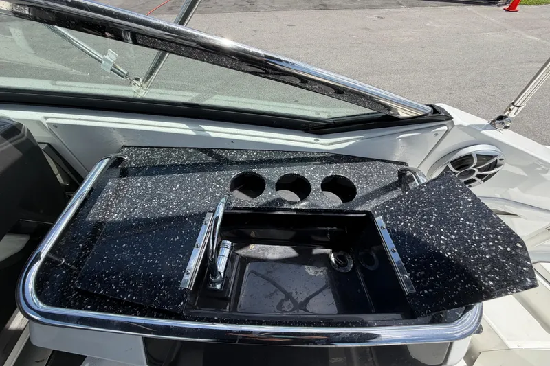 Slide: The Image of 2015 Monterey 288SS Super Sport boat interior with speckled countertop and sink. - 24