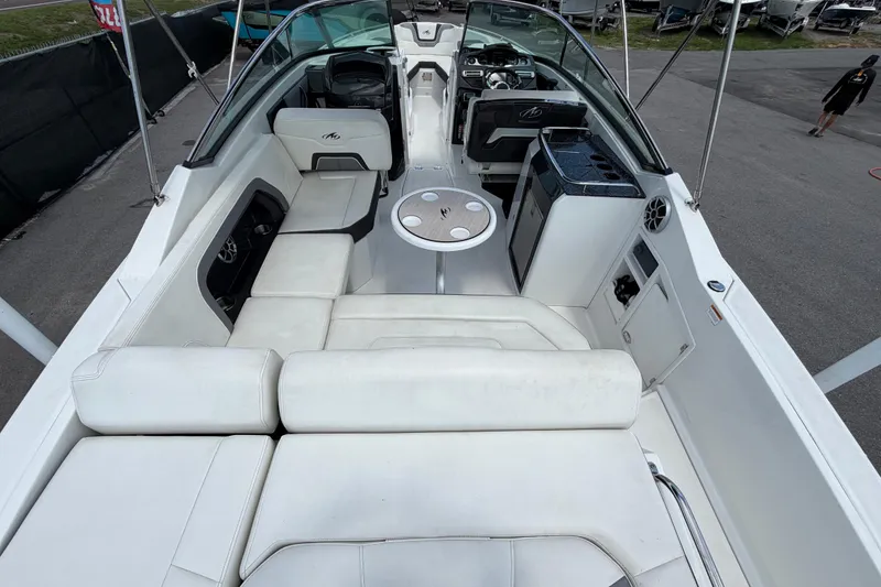 Slide: The Image of 2015 Monterey 288SS Super Sport boat interior with white seating and modern amenities. - 19