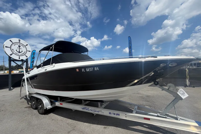 Slide: The Image of 2015 Monterey 288SS Super Sport boat on trailer under blue sky. - 81