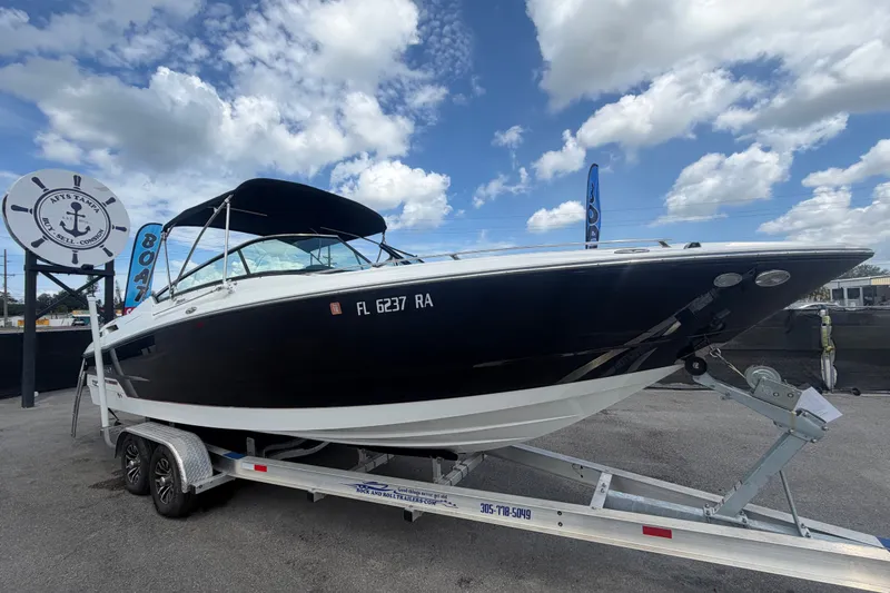 The Image of 2015 Monterey 288SS Super Sport boat on trailer under cloudy sky. - 0