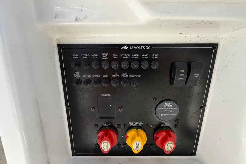 Slide: The Image of Control panel of a 2015 Monterey 288SS Super Sport boat with various switches and dials. - 74