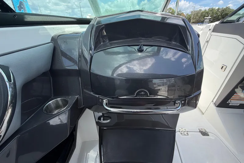 Slide: The Image of Dashboard of a 2015 Monterey 288SS Super Sport boat with sleek design features. - 44