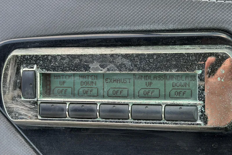 Slide: The Image of A control panel with buttons for functions like "Hatch Up/Down" and "Windlass Up/Down." - 40