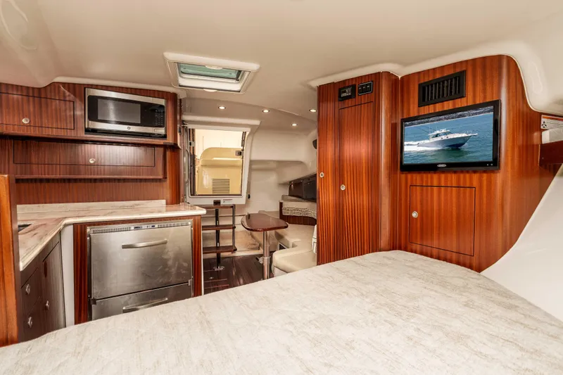 Slide: The Image of Luxurious interior of 2022 Pursuit OS 385 Offshore yacht with modern amenities. - 28