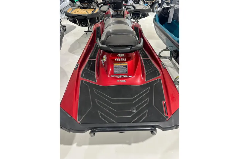 Slide: The Image of Red 2019 Yamaha WaveRunner VX Limited in a showroom setting. - 21