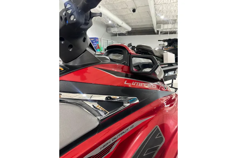 Slide: The Image of 2019 Yamaha WaveRunner VX Limited in showroom, showcasing sleek red design and features. - 17