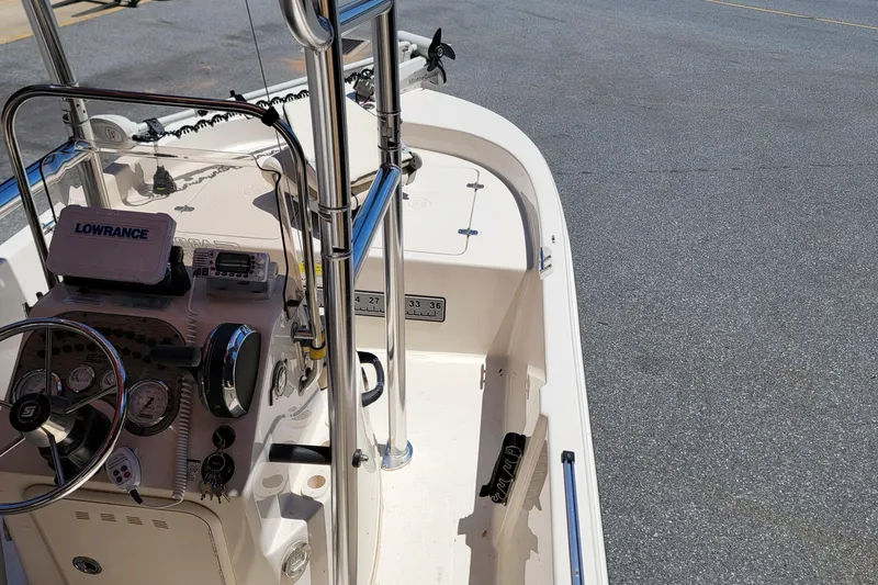 Slide: The Image of 2021 Carolina Skiff 178 JLS boat interior with steering console and navigation equipment. - 15