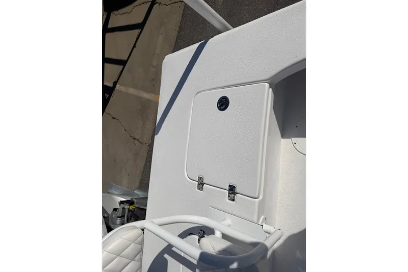 Slide: The Image of White deck of 2026 Skuta 24 Cat boat with storage compartment. - 56