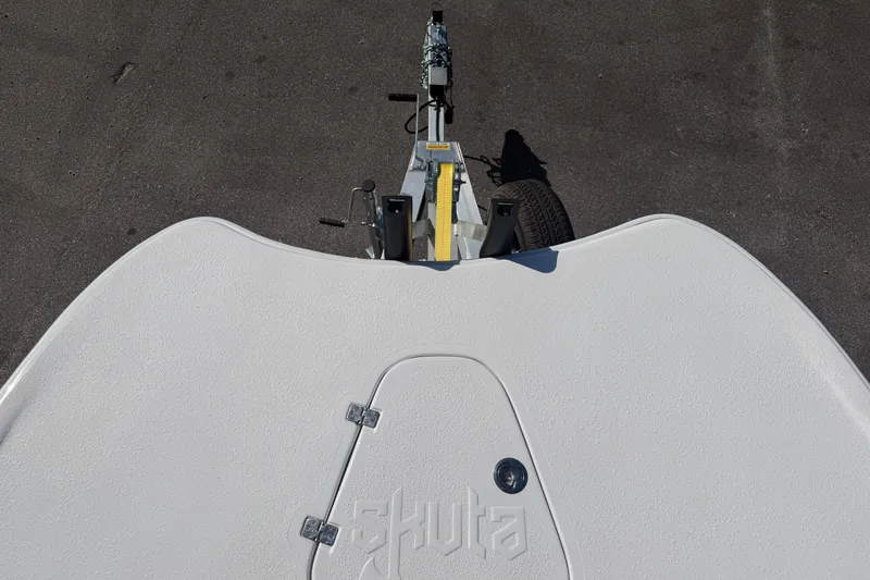 Slide: The Image of Top view of a 2026 Skuta 24 Cat boat on a trailer. - 36