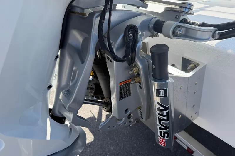 Slide: The Image of Close-up of 2026 Skuta 24 Cat boat engine mount and hydraulic system. - 23