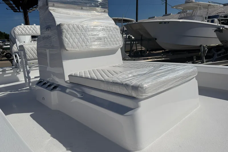 Slide: The Image of 2026 Skuta 24 Cat boat with wrapped seating, showcasing sleek design and modern features. - 16