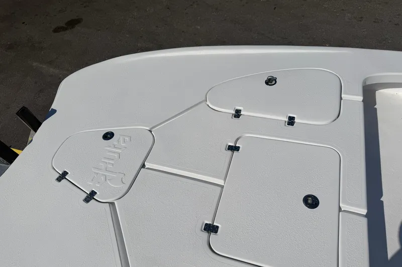 Slide: The Image of Deck of 2026 Skuta 24 Cat boat with storage compartments. - 38