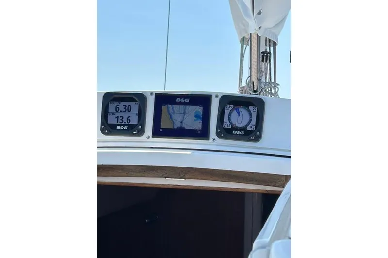Slide: The Image of B&G navigation instruments on a 2004 J Boats J/109 sailboat dashboard. - 15
