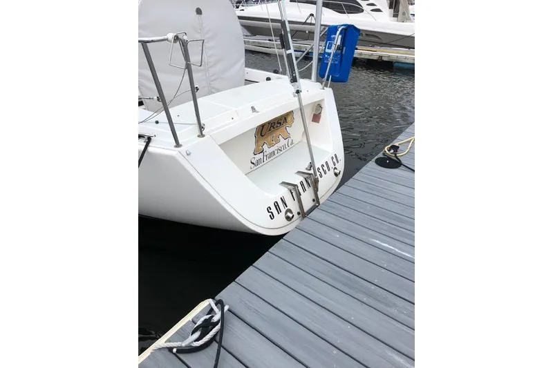 Slide: The Image of 2004 J Boats J/109 sailboat docked, featuring "San Francisco, CA" on the stern. - 21