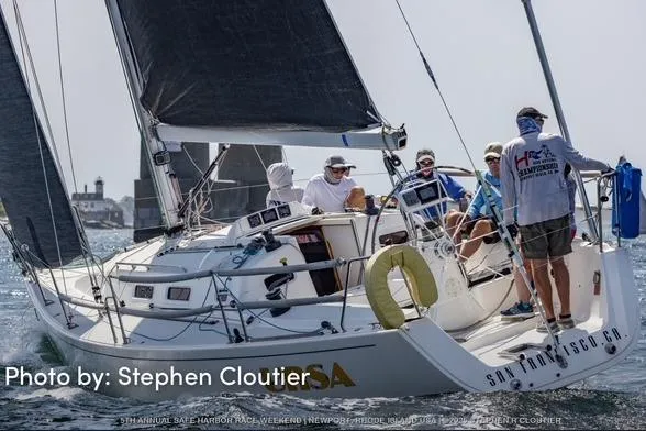 Slide: The Image of 2004 J Boats J/109 sailing with crew during a race, photographed by Stephen Cloutier. - 0