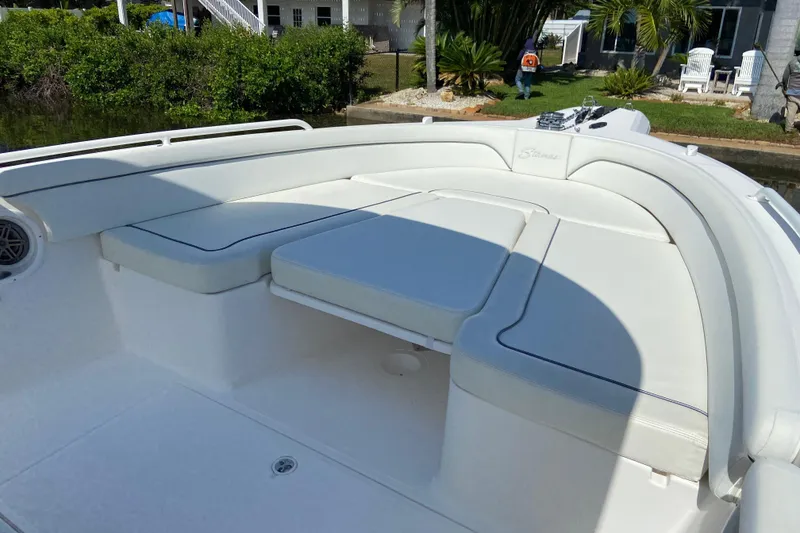 Slide: The Image of 2017 Stamas 317 Tarpon boat with spacious white seating area and sleek design. - 48