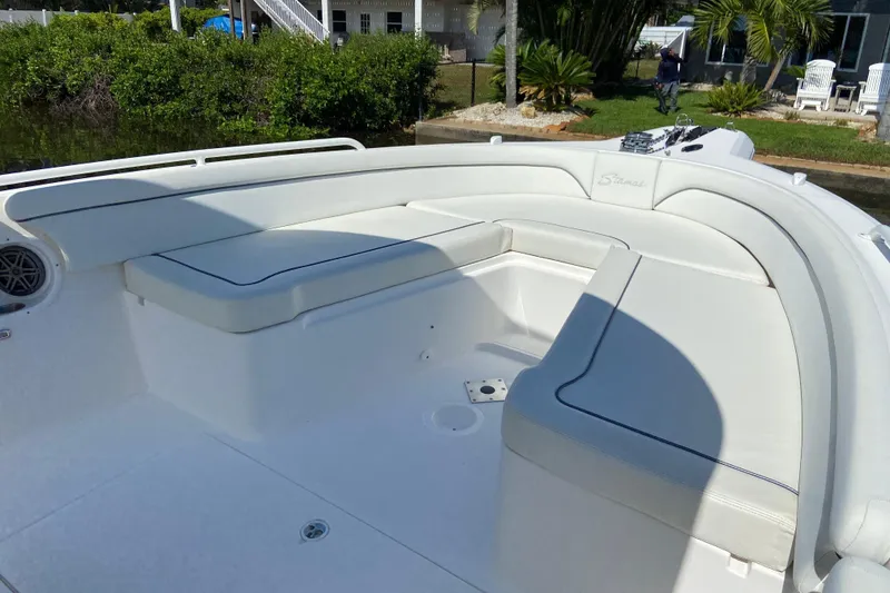 Slide: The Image of 2017 Stamas 317 Tarpon boat with spacious white seating area and sleek design. - 47