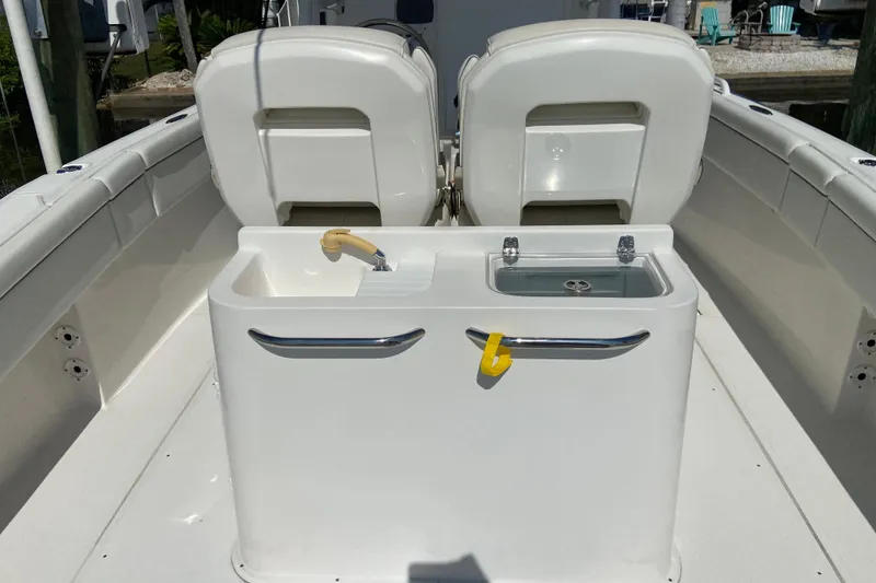 Slide: The Image of 2017 Stamas 317 Tarpon boat interior with dual seats and utility station. - 26
