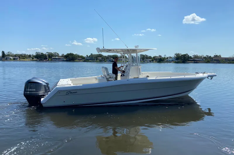 Slide: The Image of 2017 Stamas 317 Tarpon boat on calm water, featuring Yamaha outboard engine. - 7
