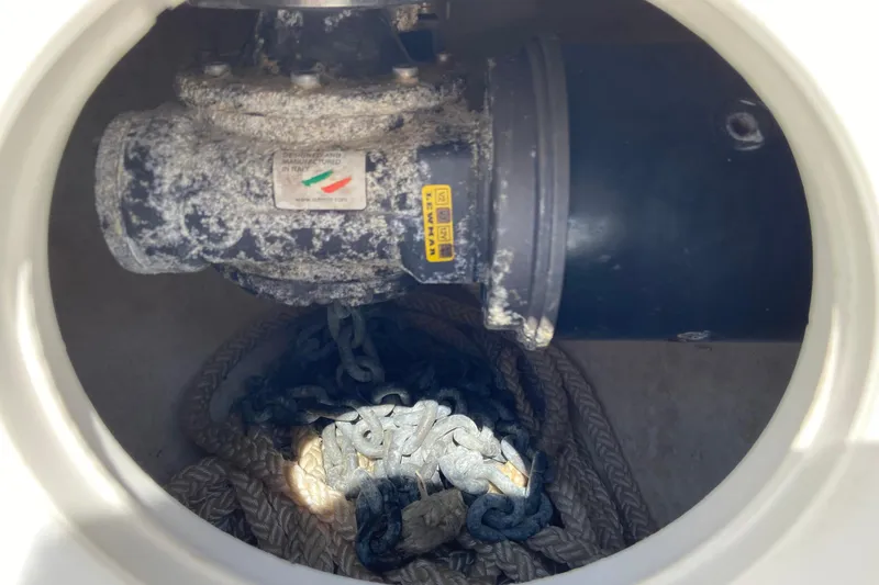 Slide: The Image of Anchor locker of 2017 Stamas 317 Tarpon boat with chain and rope. - 53