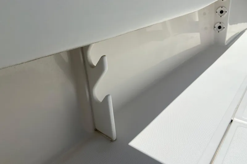 Slide: The Image of 2017 Stamas 317 Tarpon boat interior detail with rod holder and white finish. - 22