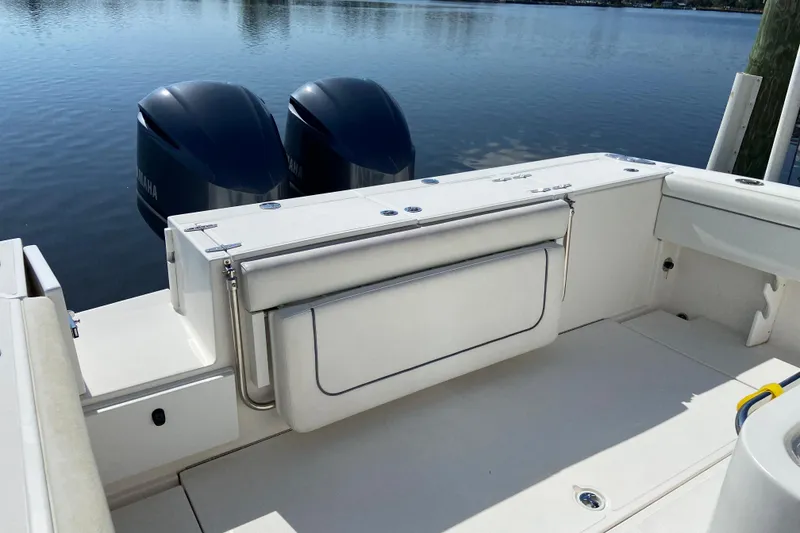 Slide: The Image of 2017 Stamas 317 Tarpon boat with dual Yamaha engines on calm water. - 13