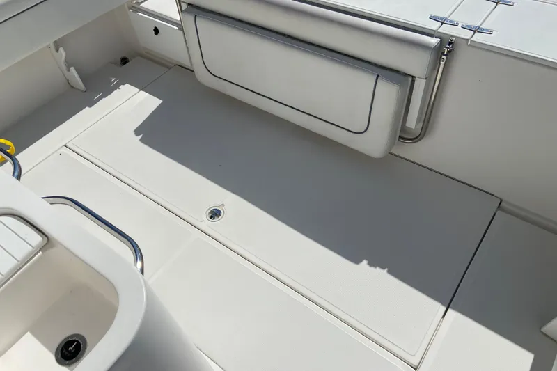Slide: The Image of The image shows the cockpit of a 2017 Stamas 317 Tarpon boat. - 18