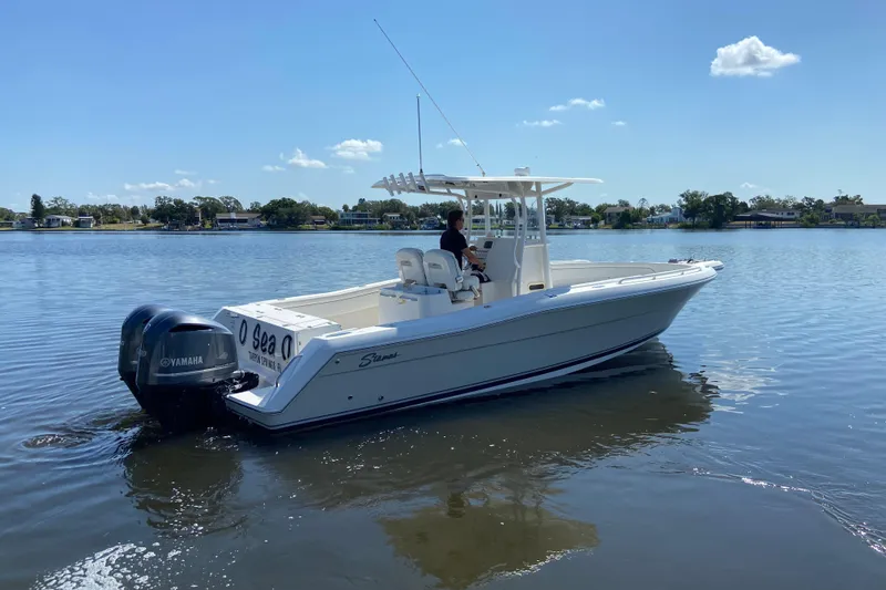 Slide: The Image of 2017 Stamas 317 Tarpon boat on calm water with Yamaha engines. - 6