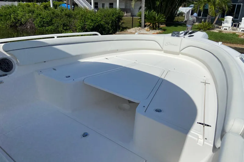 Slide: The Image of 2017 Stamas 317 Tarpon boat deck with seating and storage compartments. - 46