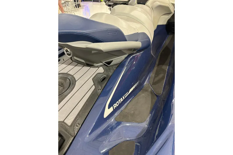 Slide: The Image of 2023 Sea-Doo GTX 230 jet ski, featuring blue and gray seating and Rotax engine branding. - 10