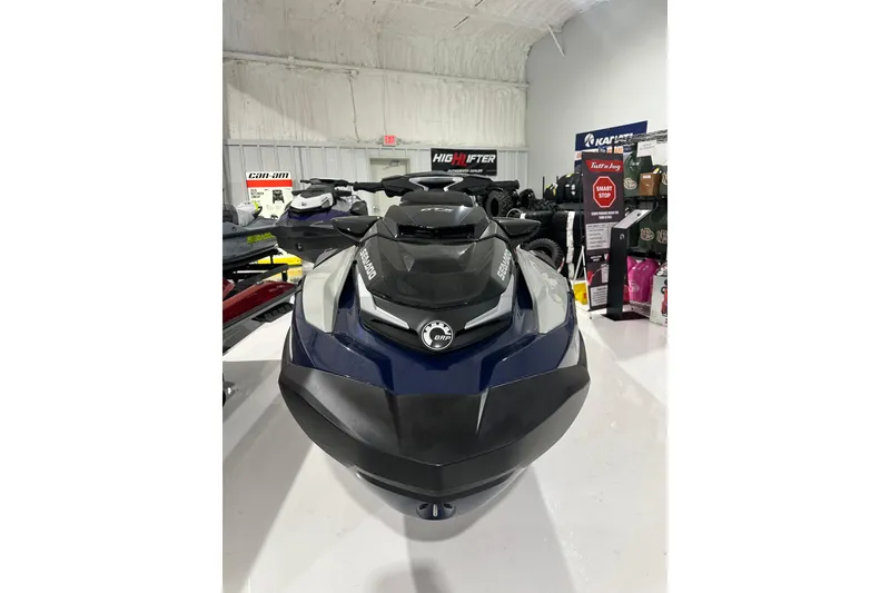 Slide: The Image of 2023 Sea-Doo GTX 230 jet ski displayed in a showroom. - 14