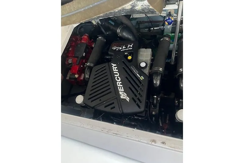 Slide: The Image of Engine compartment of a 2001 Sea Ray 340 Sundancer with Mercury components. - 21