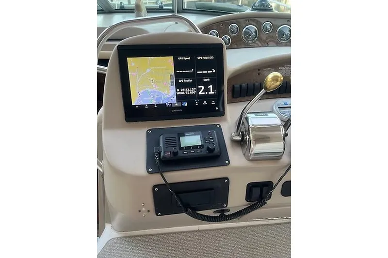 Slide: The Image of Dashboard of a 2001 Sea Ray 340 Sundancer with GPS and control panel. - 6