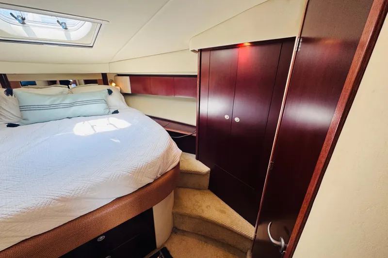 Slide: The Image of Luxurious bedroom interior of 2006 Sea Ray 44 Sedan Bridge yacht. - 6