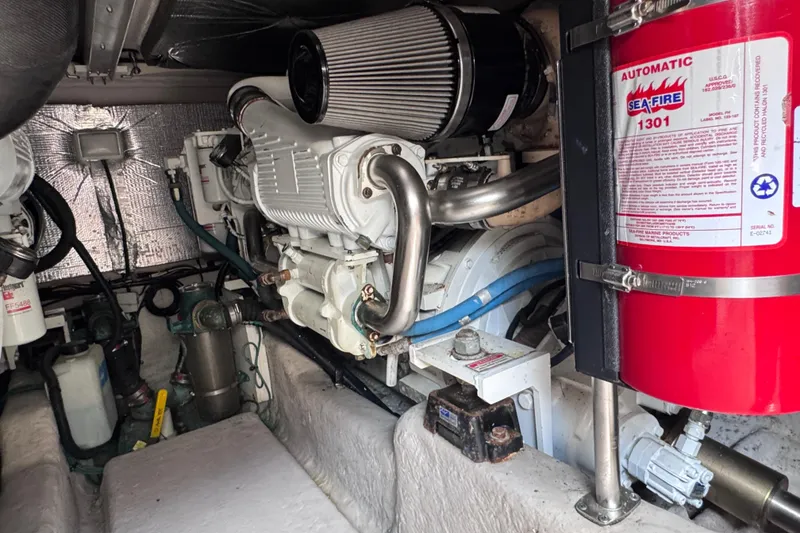 Slide: The Image of Engine room of a 2006 Sea Ray 44 Sedan Bridge with fire suppression system. - 47
