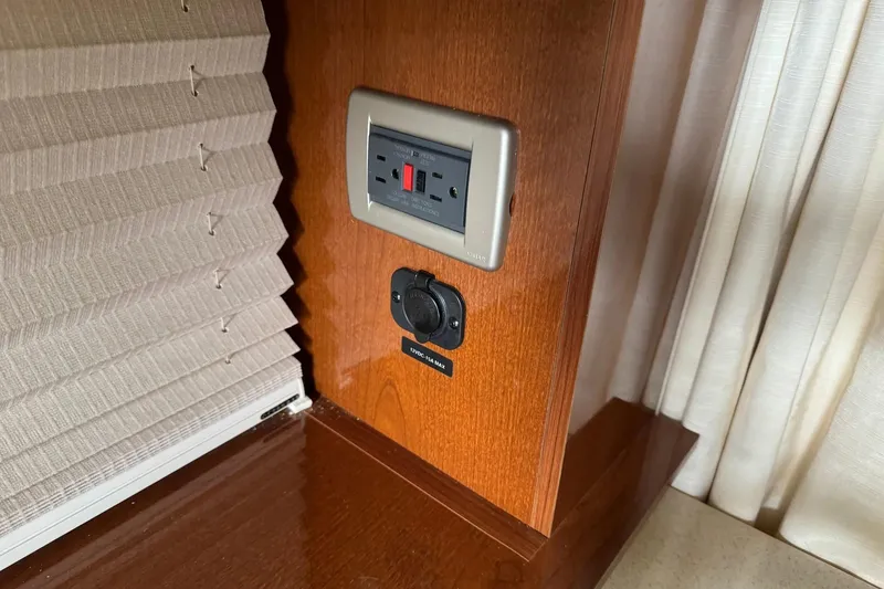 Slide: The Image of Power outlet and USB port on 2010 Sea Ray Sundancer 310 yacht interior. - 35