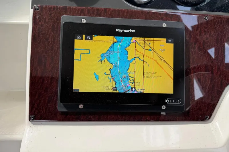Slide: The Image of Raymarine navigation display on 2010 Sea Ray Sundancer 310 boat dashboard. - 4